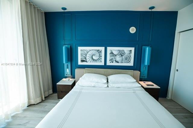 bedroom featuring light hardwood / wood-style flooring