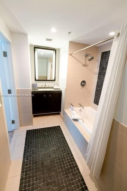 bathroom featuring tile flooring and oversized vanity