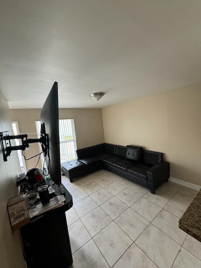 living room with light tile floors