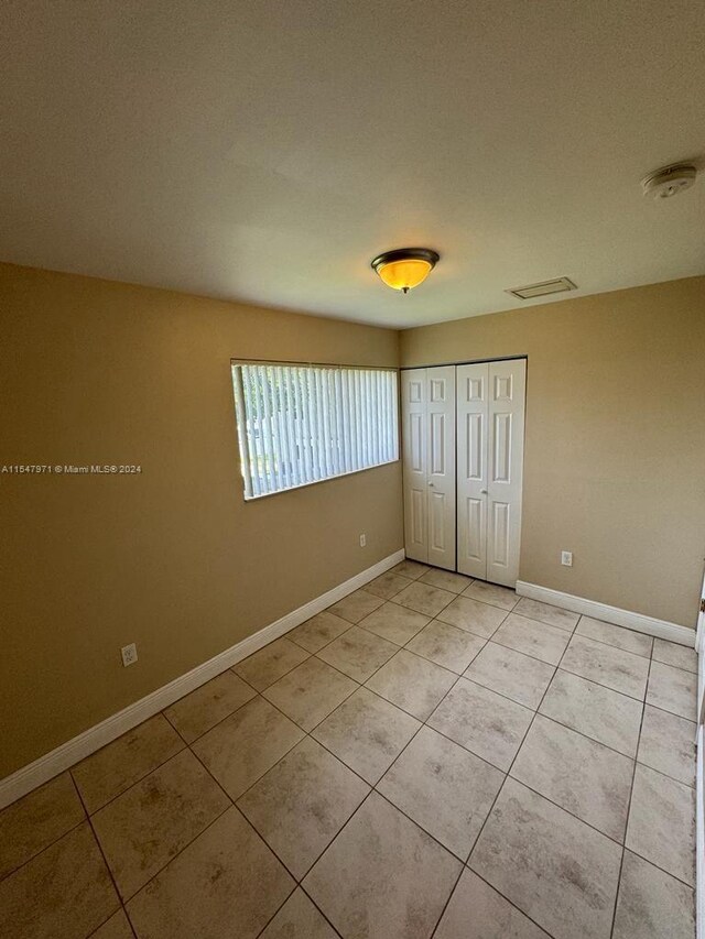 view of tiled empty room