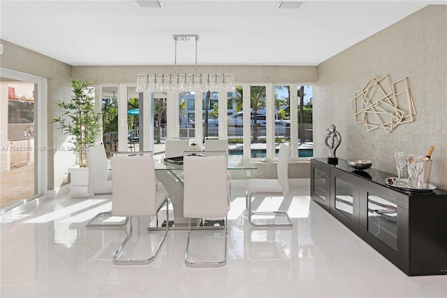 dining area with a chandelier