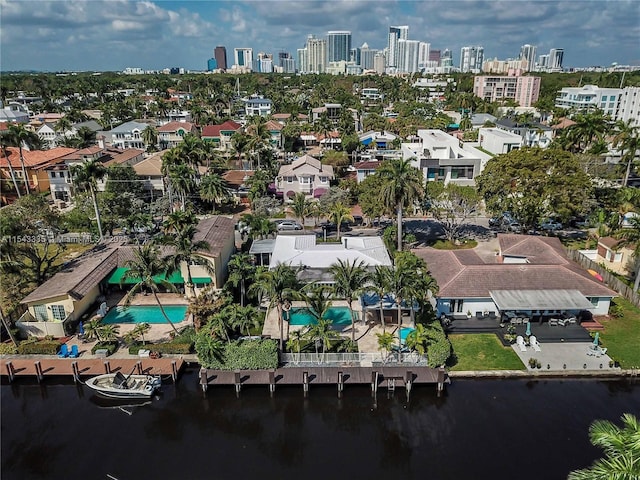 birds eye view of property featuring a water view