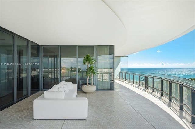 balcony featuring a water view