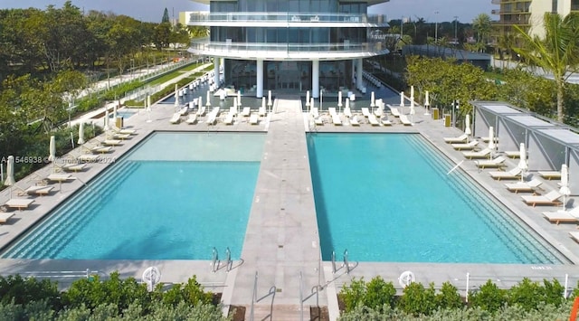 view of swimming pool with a patio area