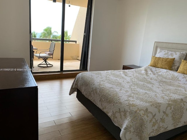 bedroom featuring dark hardwood / wood-style flooring