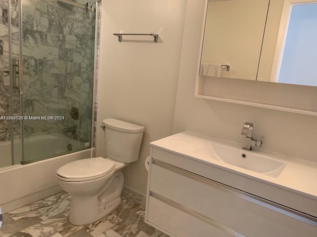 full bathroom with combined bath / shower with glass door, toilet, vanity, and tile flooring