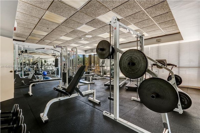 gym featuring a drop ceiling