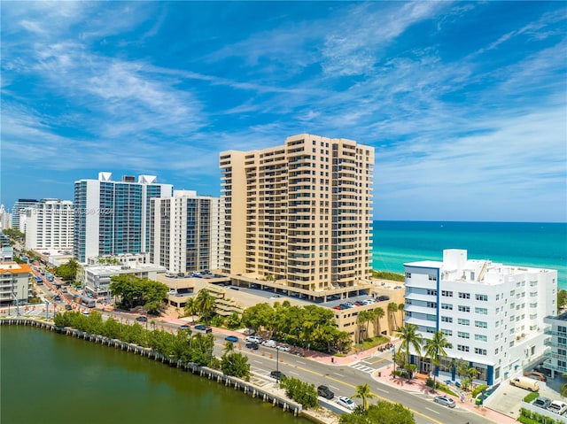 view of building exterior with a water view