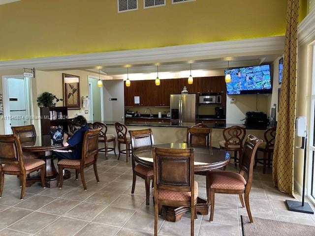 dining room featuring light tile patterned floors