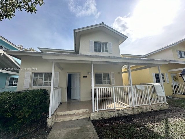 view of front of home featuring covered porch