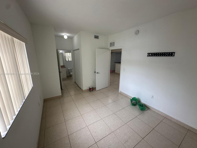 view of tiled spare room