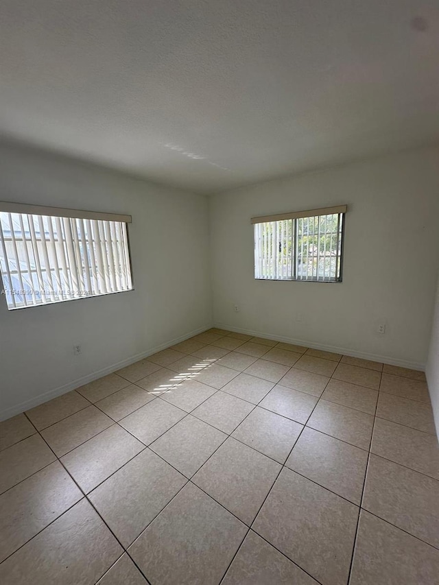 view of tiled empty room