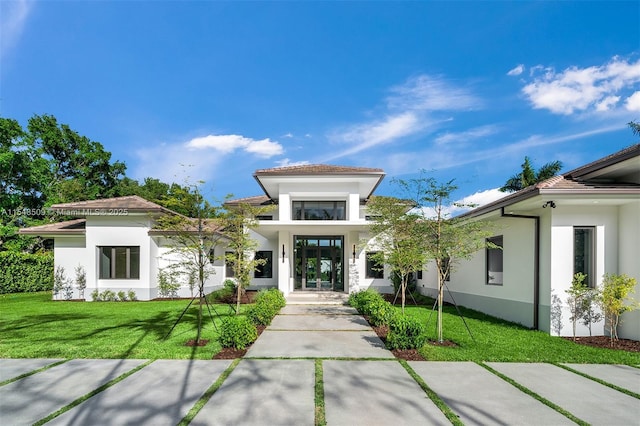 view of front facade featuring a front yard