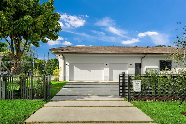 garage with a yard