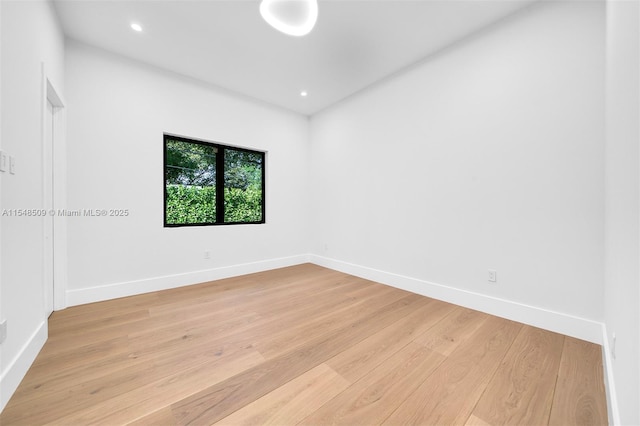 unfurnished room featuring light hardwood / wood-style flooring