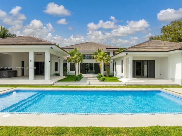 back of house with a patio area