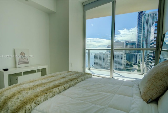 bedroom featuring a view of city