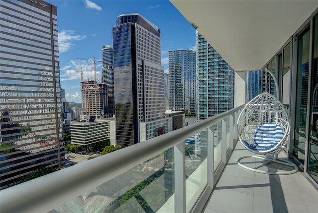 balcony featuring a view of city