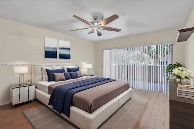 bedroom featuring ceiling fan, access to outside, and dark wood-type flooring