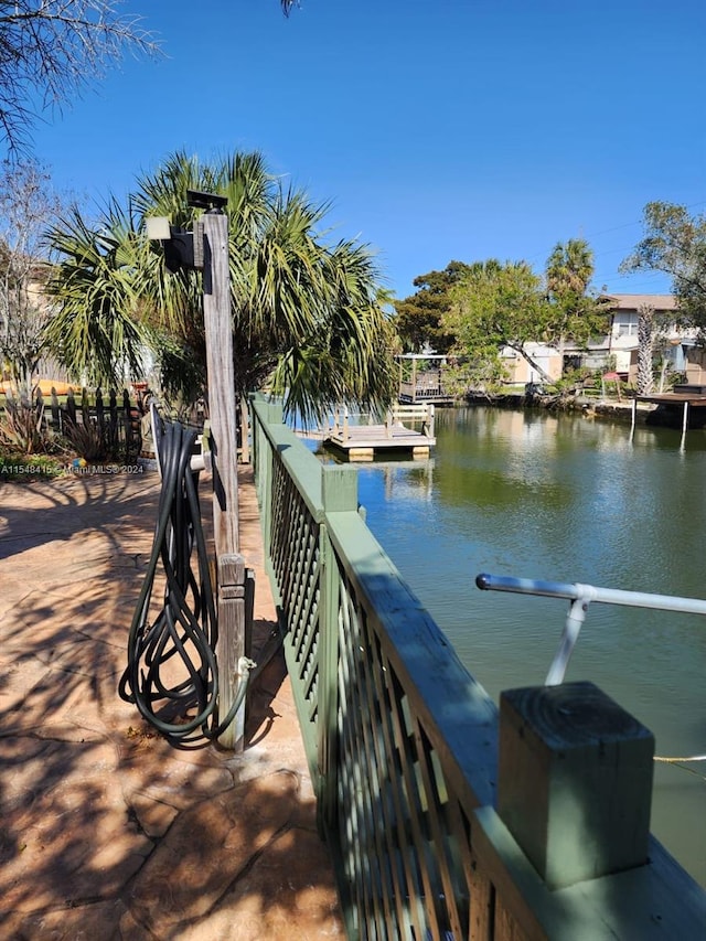 dock area featuring a water view