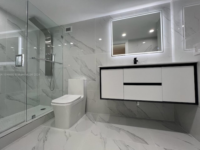 bathroom with tile walls, walk in shower, vanity, and toilet