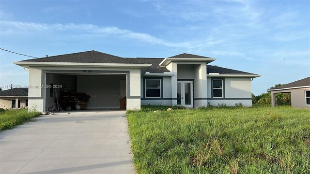 view of front of home with a garage