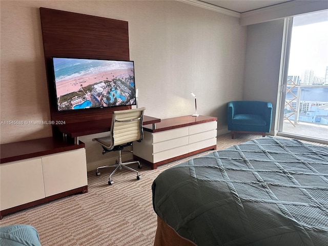 carpeted bedroom featuring ornamental molding