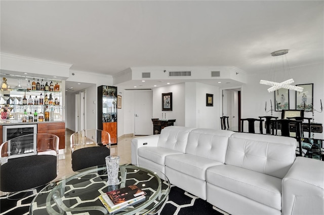 tiled living room featuring indoor bar, crown molding, and beverage cooler