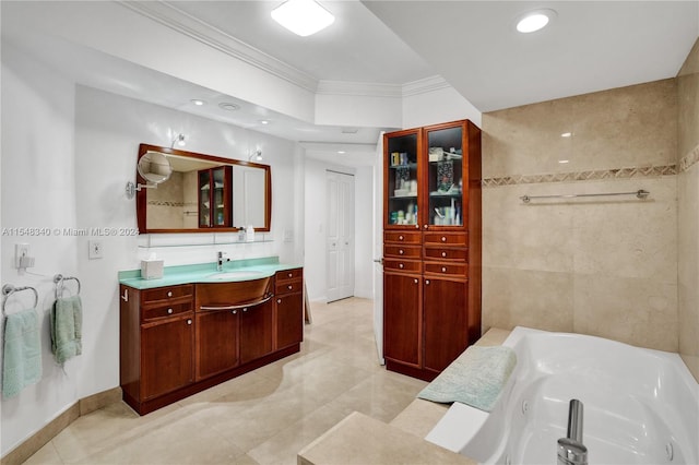 bathroom featuring tile patterned flooring, tile walls, a bath, and vanity