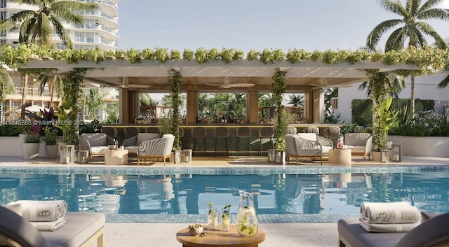 view of swimming pool with a patio area and a pergola