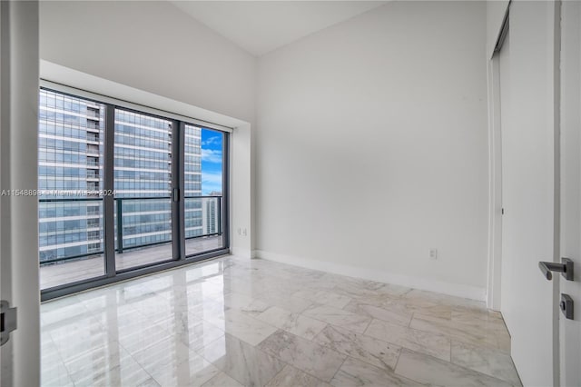 view of tiled empty room