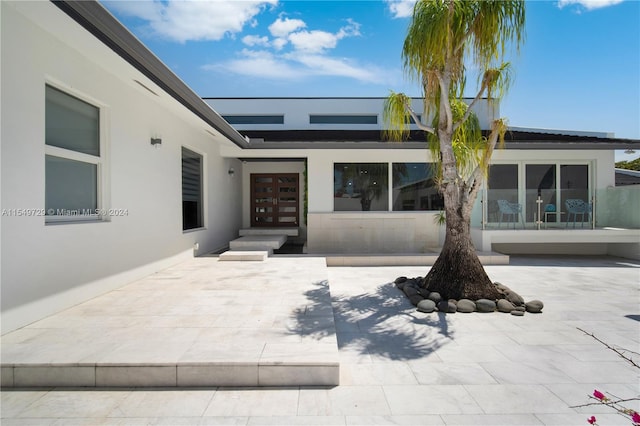 exterior space with a patio area and french doors