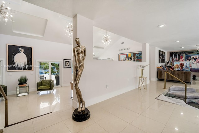 interior space featuring a notable chandelier and light tile floors