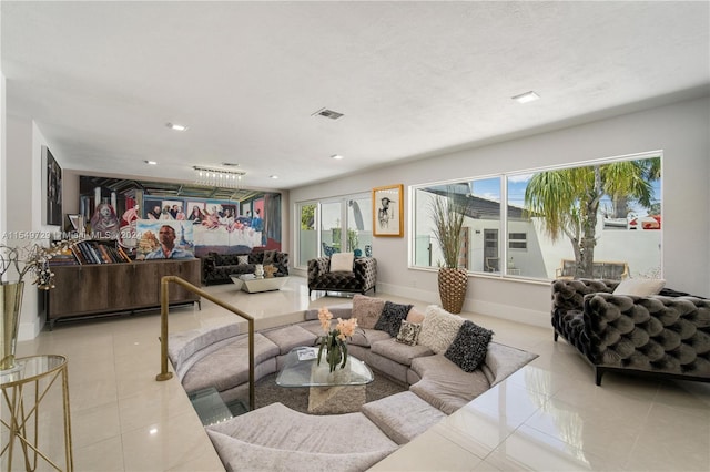 living room with tile flooring and plenty of natural light