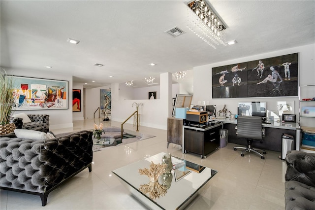 home office featuring a textured ceiling, an inviting chandelier, and light tile flooring