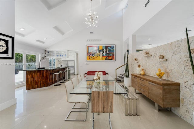 dining room featuring high vaulted ceiling, an inviting chandelier, and light tile floors