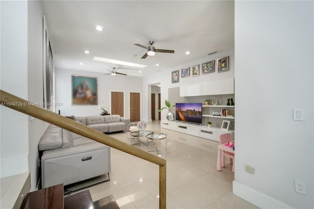 kitchen with white cabinets, ceiling fan, and light tile floors