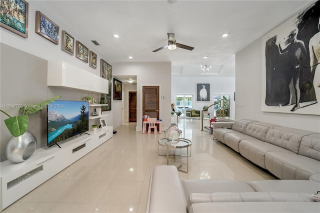 living room featuring ceiling fan and light tile flooring