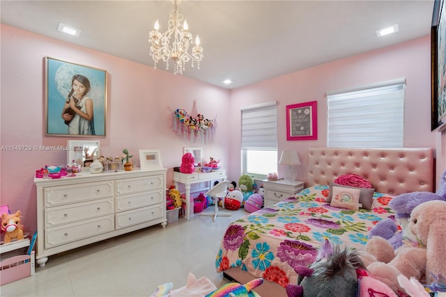 bedroom featuring a notable chandelier