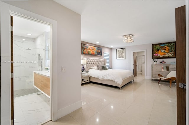 tiled bedroom featuring connected bathroom