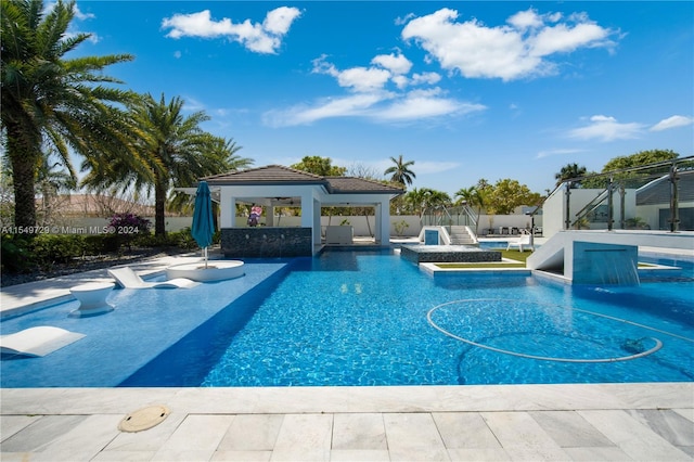 view of pool with a patio area and a gazebo