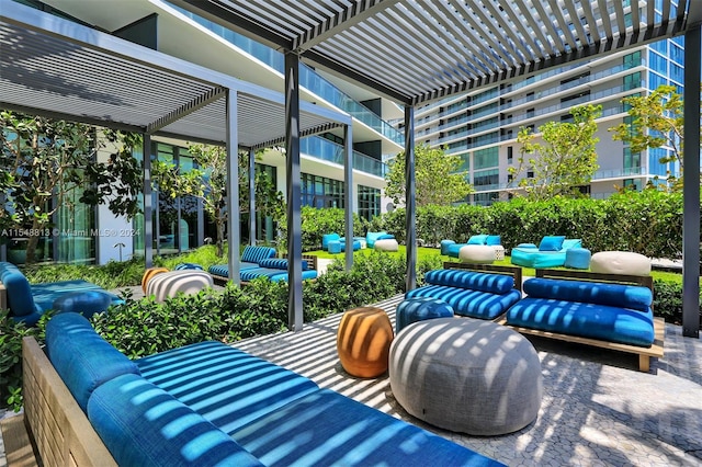 view of terrace featuring a balcony, an outdoor living space, and a pergola