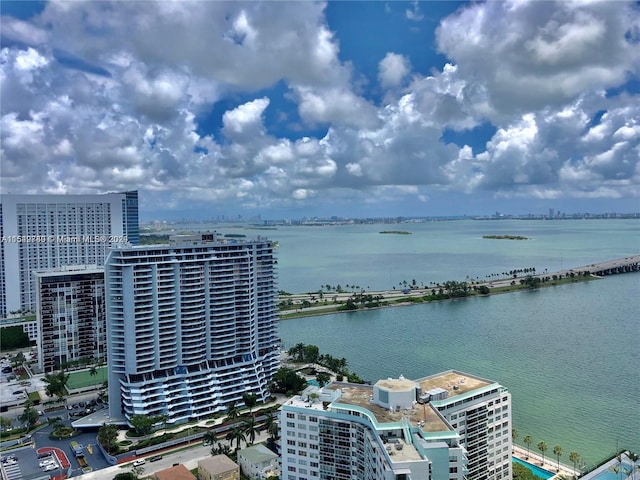 birds eye view of property featuring a water view