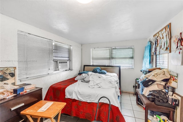 tiled bedroom featuring cooling unit