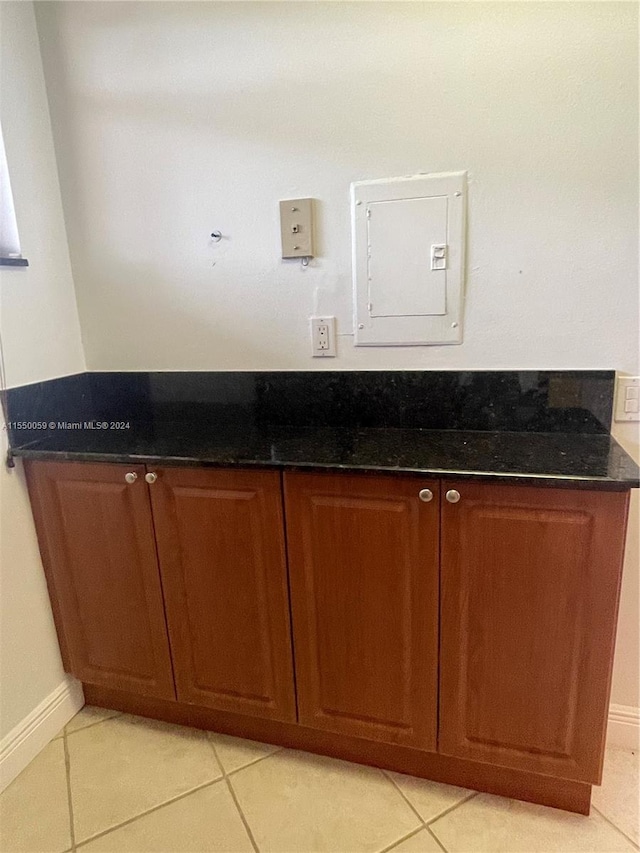 bathroom featuring tile floors