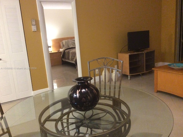 dining room with light tile flooring