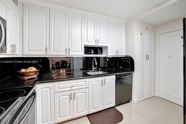 kitchen featuring sink, backsplash, black dishwasher, light tile flooring, and white cabinetry