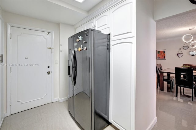 laundry room with light tile flooring