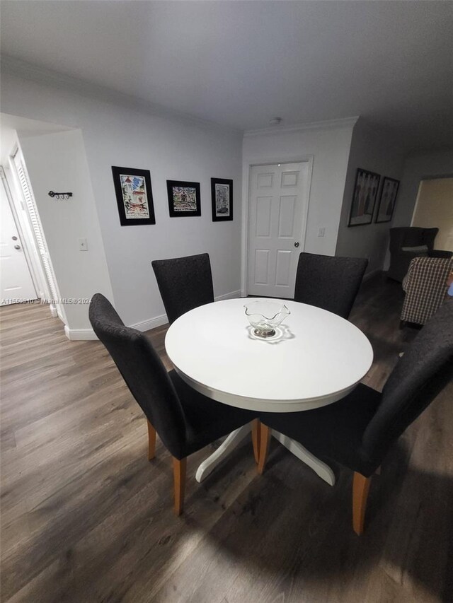 dining area featuring wood-type flooring