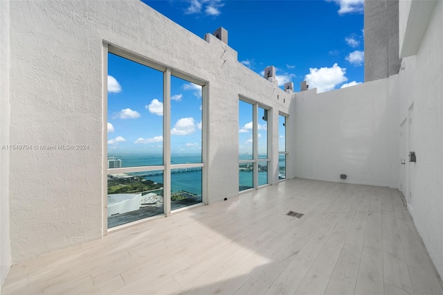 view of patio / terrace with a water view